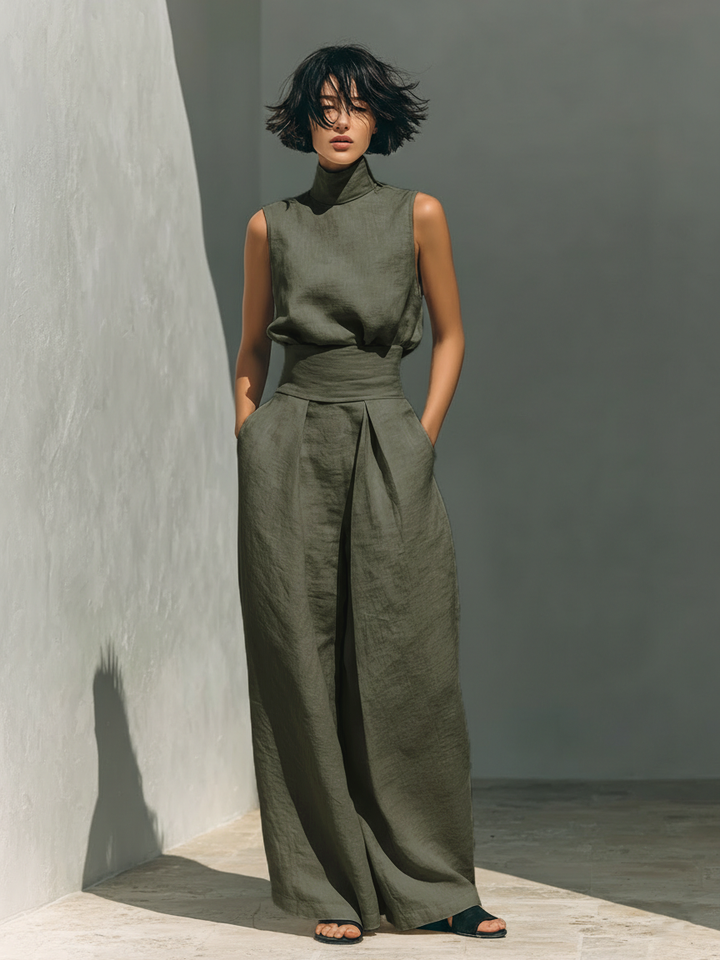 Conjunto que consiste en una blusa sin mangas y pantalones de pierna ancha, hecho de una mezcla de algodón y lino.